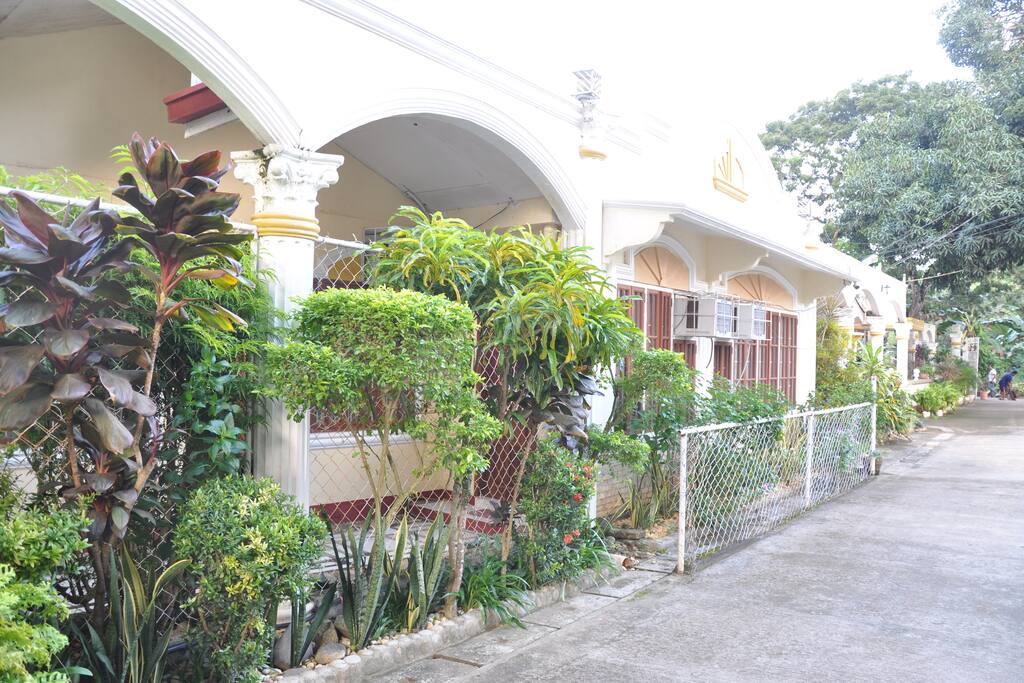 at the compound of d Lucky Garden Inn other houses