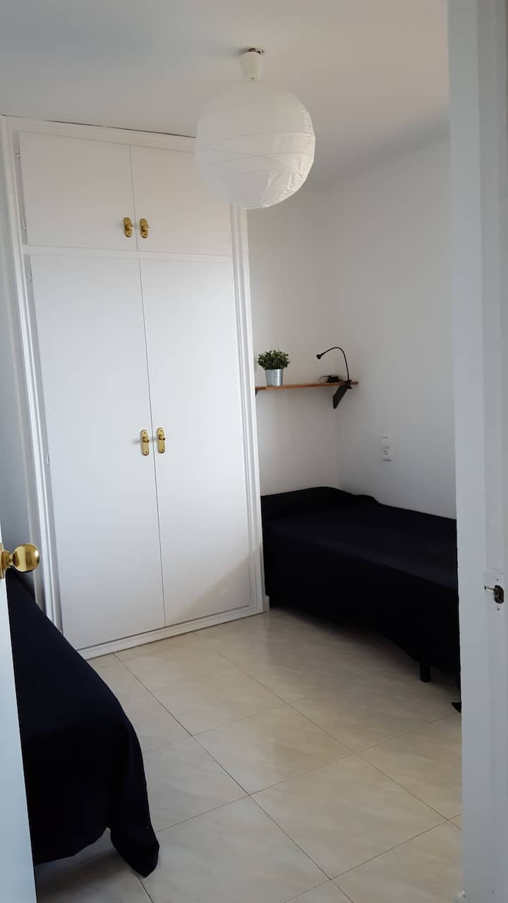 Outdoor room with 2 beds