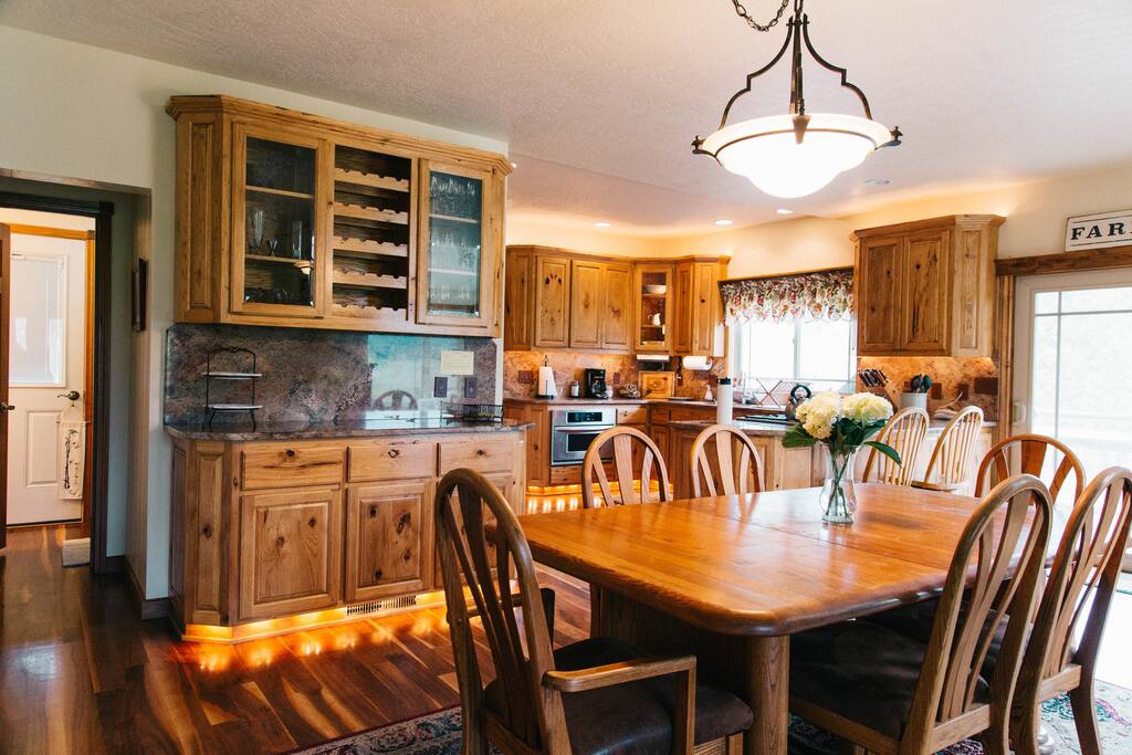 Entrance to the Farmhouse brings you to the open dining space and kitchen.