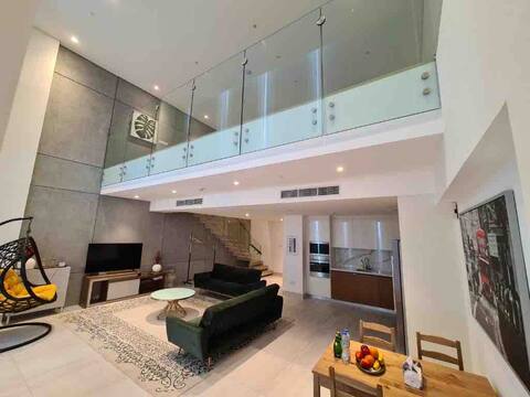1-Bed Loft with Pool View, Steps from the Beach
