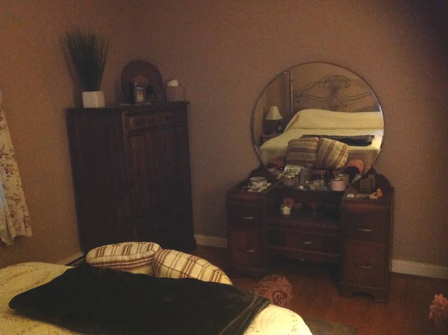 Charming 12x14' corner bedroom with double closets and large armoire for your personal use.