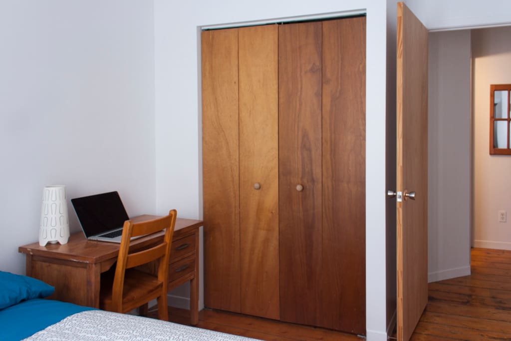 Guest bedroom with small desk to work privately