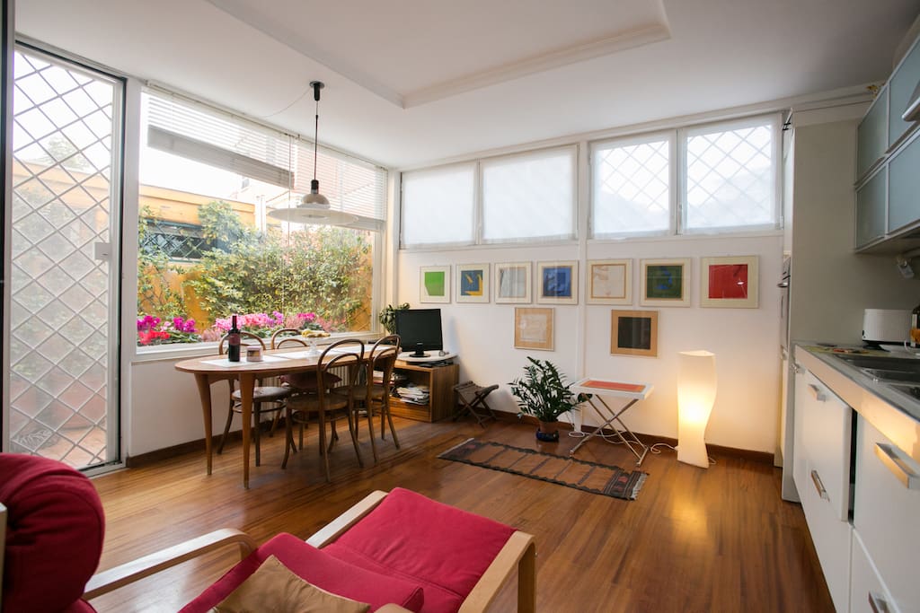 The space expands onto the cosy patio garden