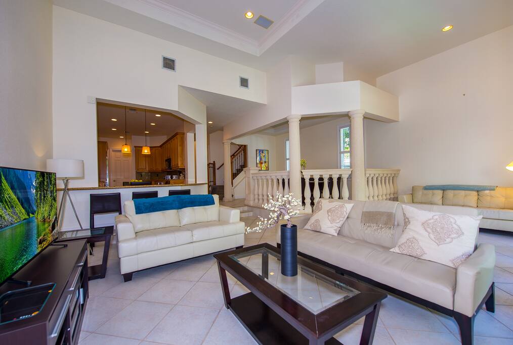 Modern minimalistic furnishings leave the room feeling light, airy, and sophisticated.
