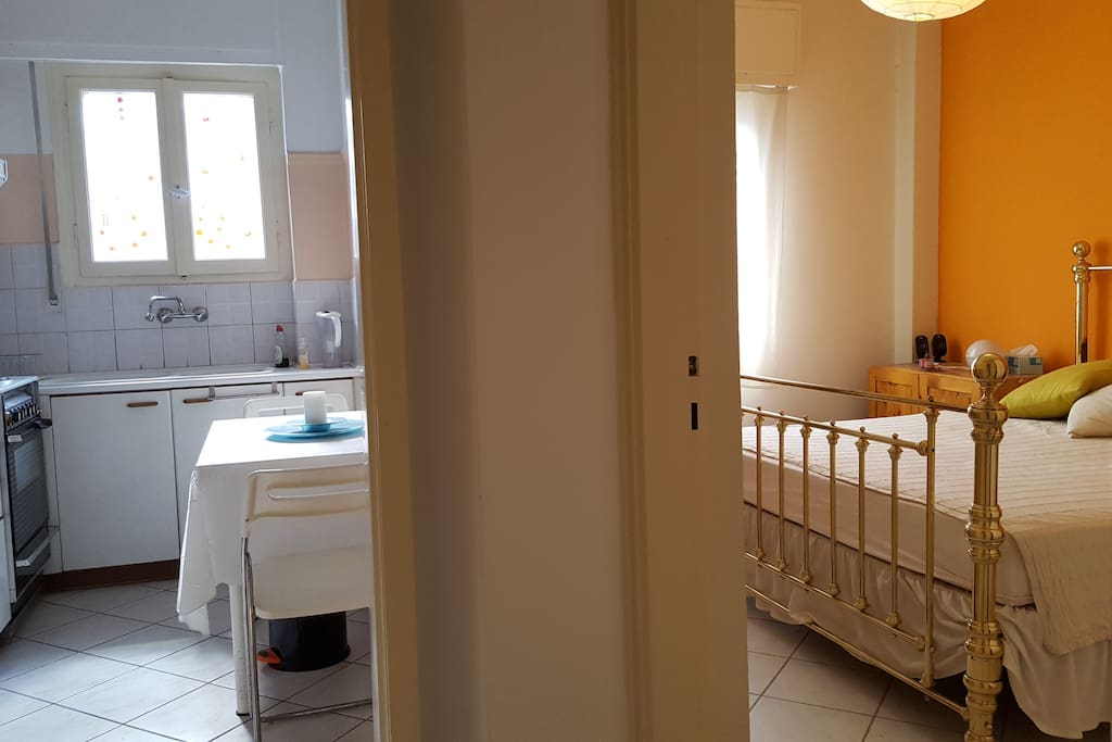 Master bedroom and kitchen