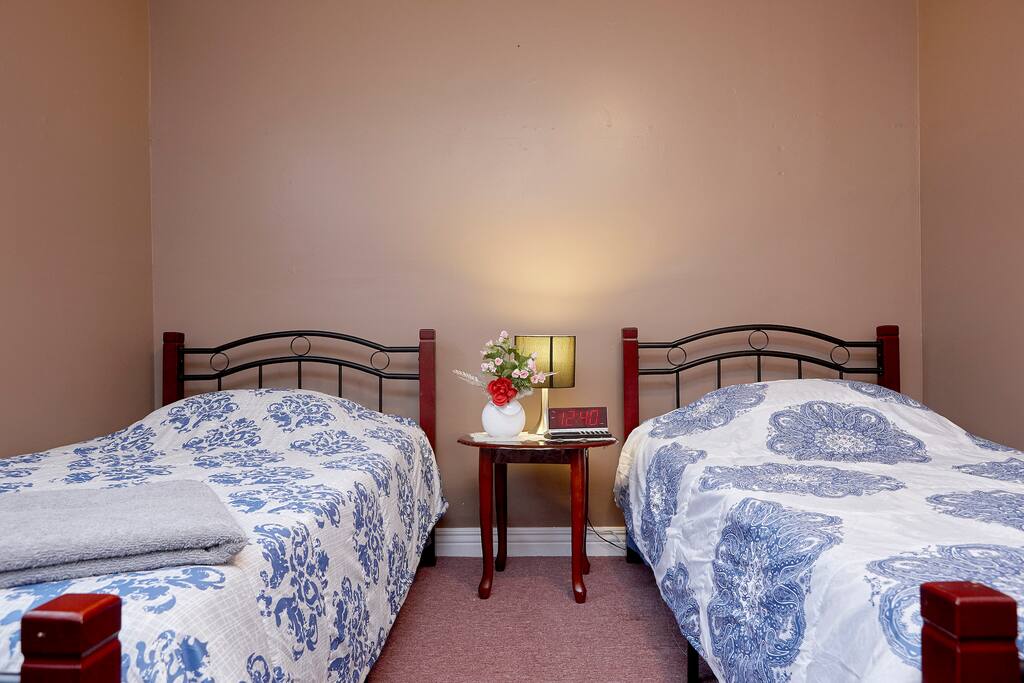 Room 1 with two single beds