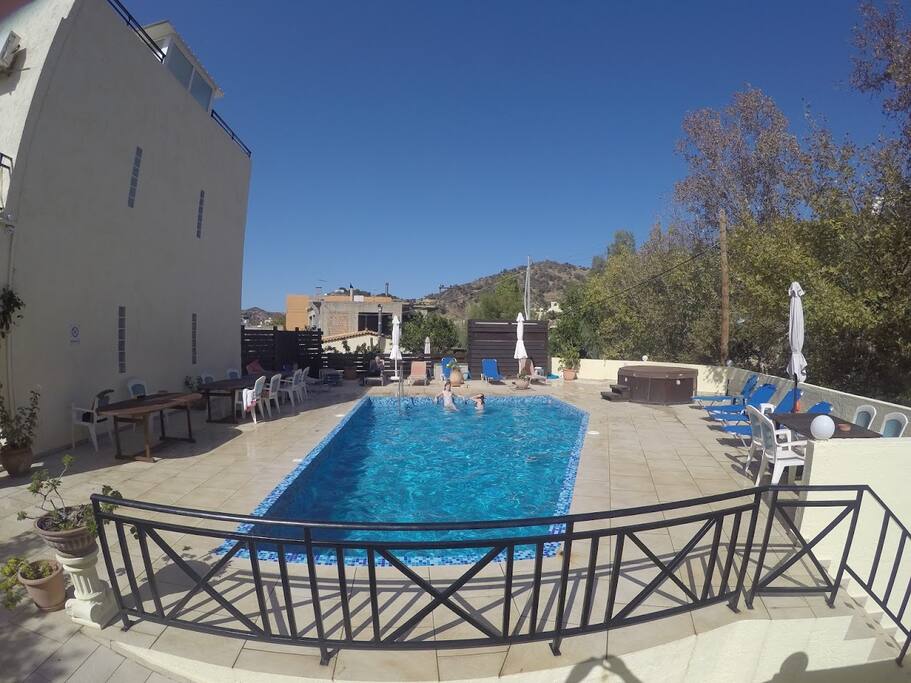 Pool area with hot tub