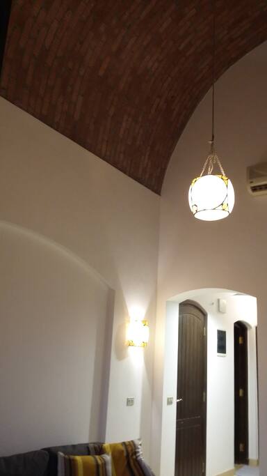 main living room with a double height Nubian vaulted celling .