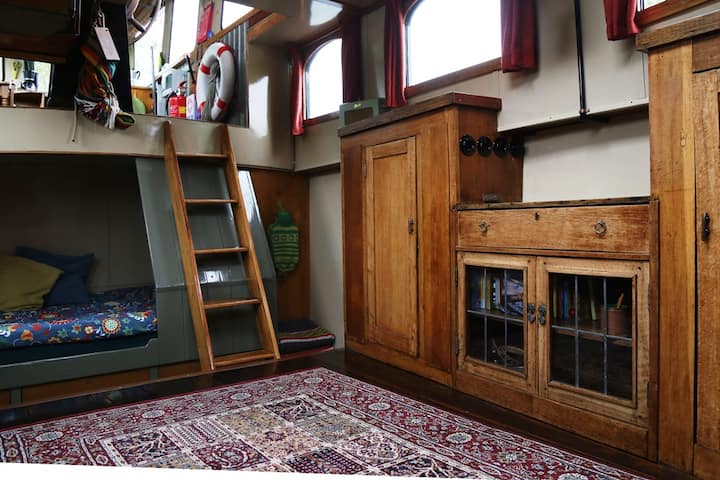Row with ship's cage and stairs to the wheelhouse