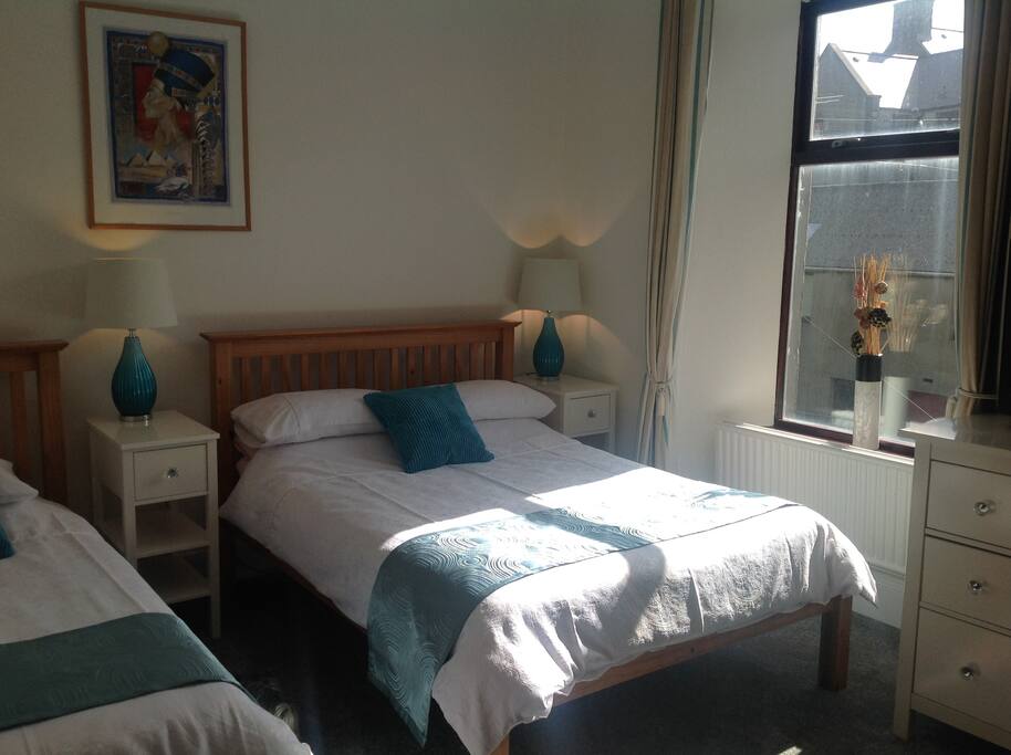 The double bed in the family room