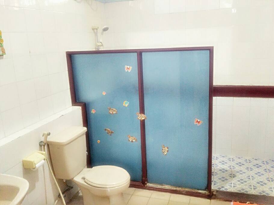 The clean bathroom with water heater