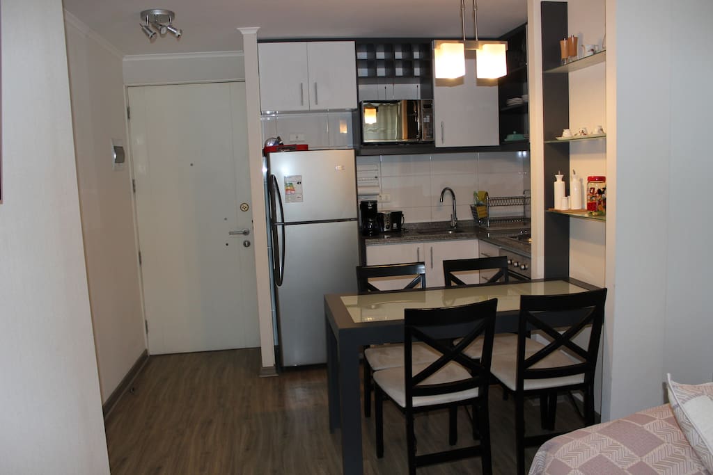 Entrada del departamento / 313.
Departamento 4 personas 2 baños, cocina americana, living, terraza