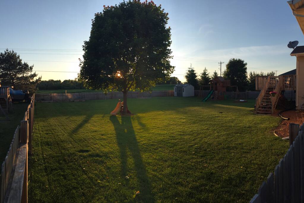 Huge back yard with deck.