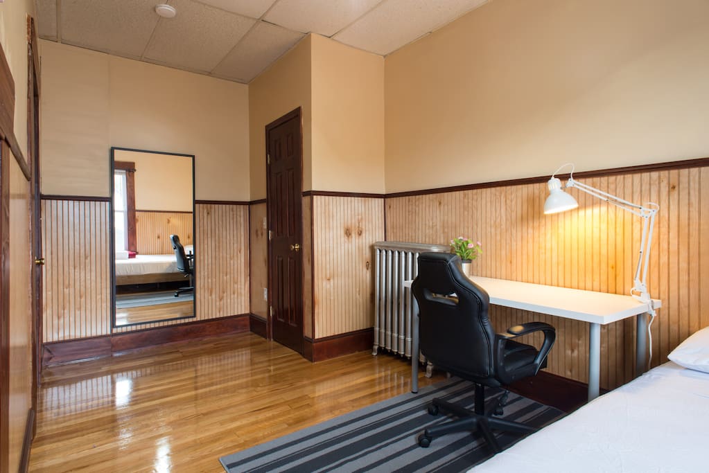 Large work space and comfy office chair for business travelers, and students.