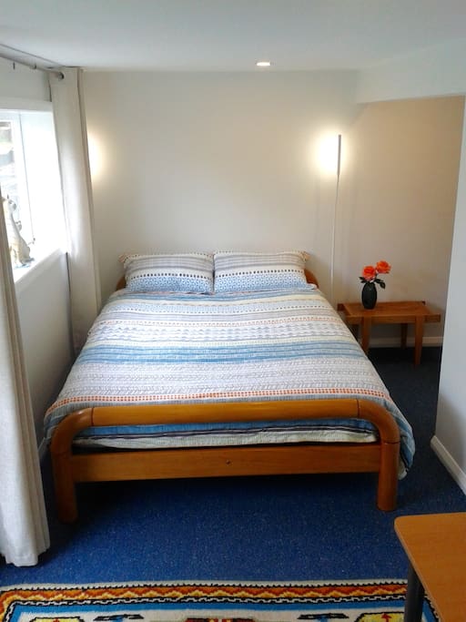 Queen slat bed with firm latex mattress