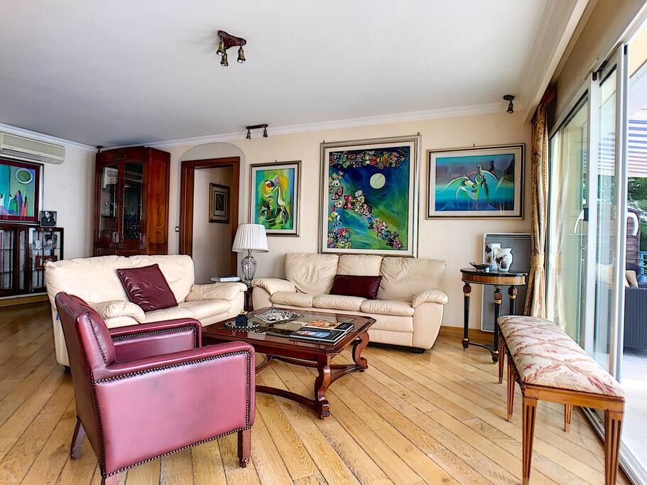 Sunny and spacy living room has a comfortable rest area