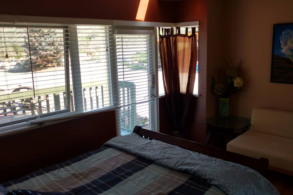 Entrance and deck as seen from queen size bed.