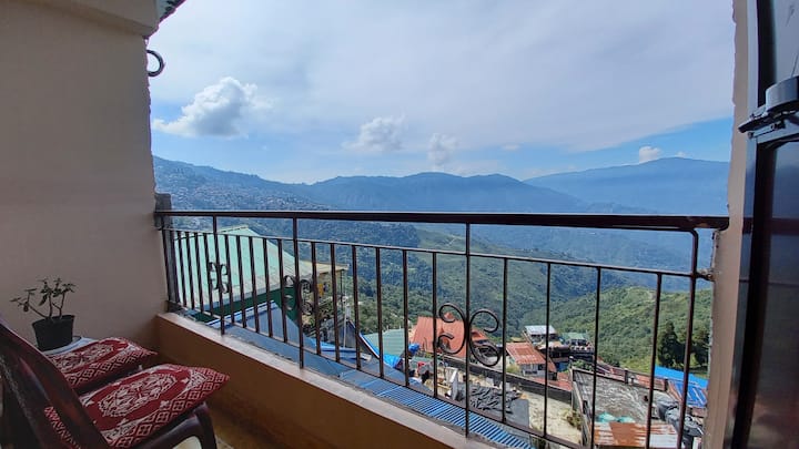 Balcony/Patio - The place comes with a private balcony attached to the bedroom which overlooks the scenic hills and tea gardens.