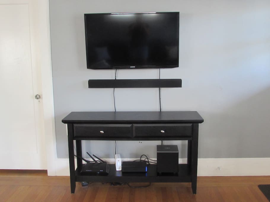 42"TV with blue tooth capable sound bar/Netflix/HBO