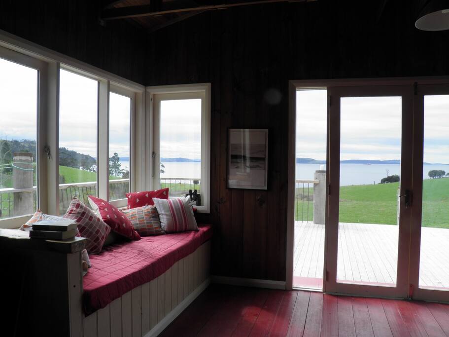 North facing window seat, perfect for reading or snoozing and watching the weather.
