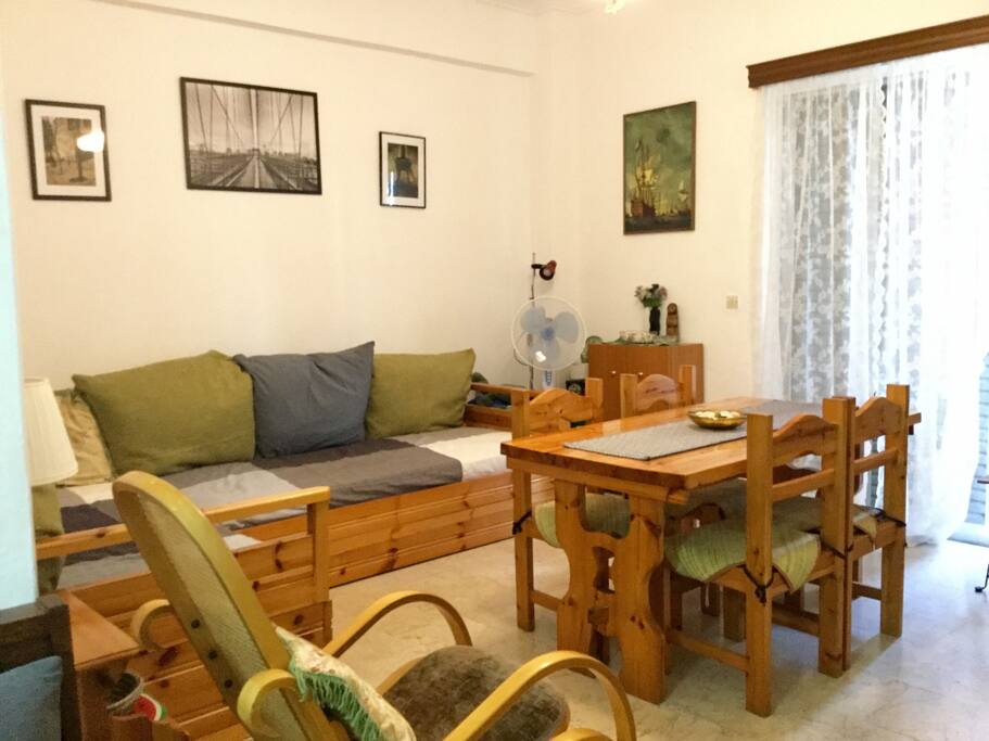 Living room with two single beds, balcony