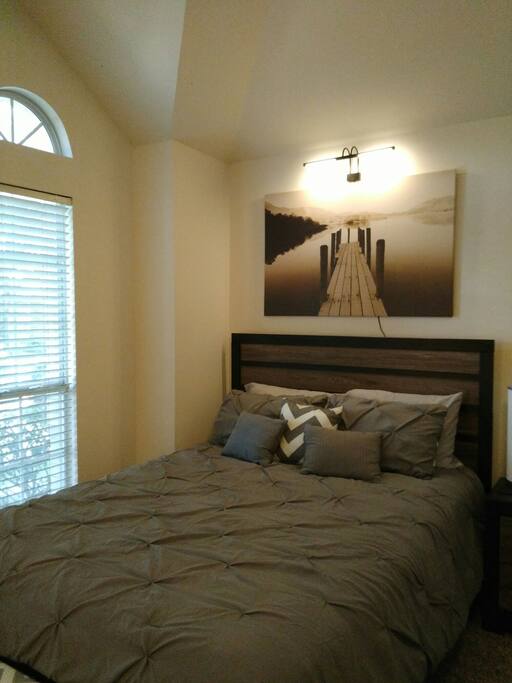 Queen size bed with plenty of extra blankets available