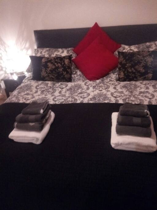 bedroom set up with king size bed , this can be set as two singles 6'3" x3'