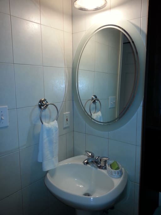 Bathroom mirror and sink.