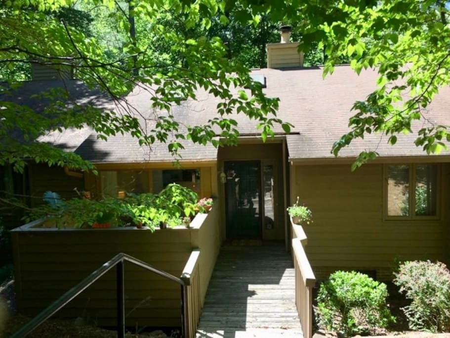 The townhouse is located in a wooded and secluded neighborhood. There is parking available right outside the home.