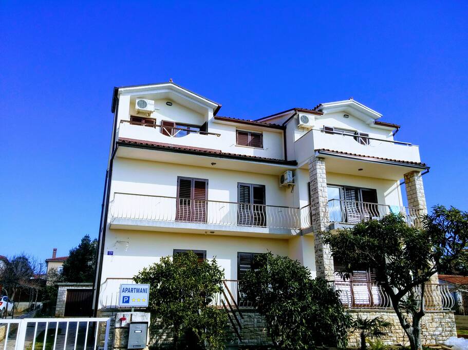 Frontal view of the house (apartment is on the top floor at the right)