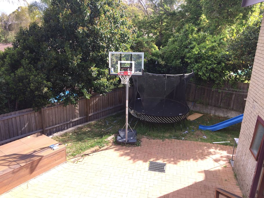The kids can enjoy playing basketball or trammelling or sliding in the back courtyard