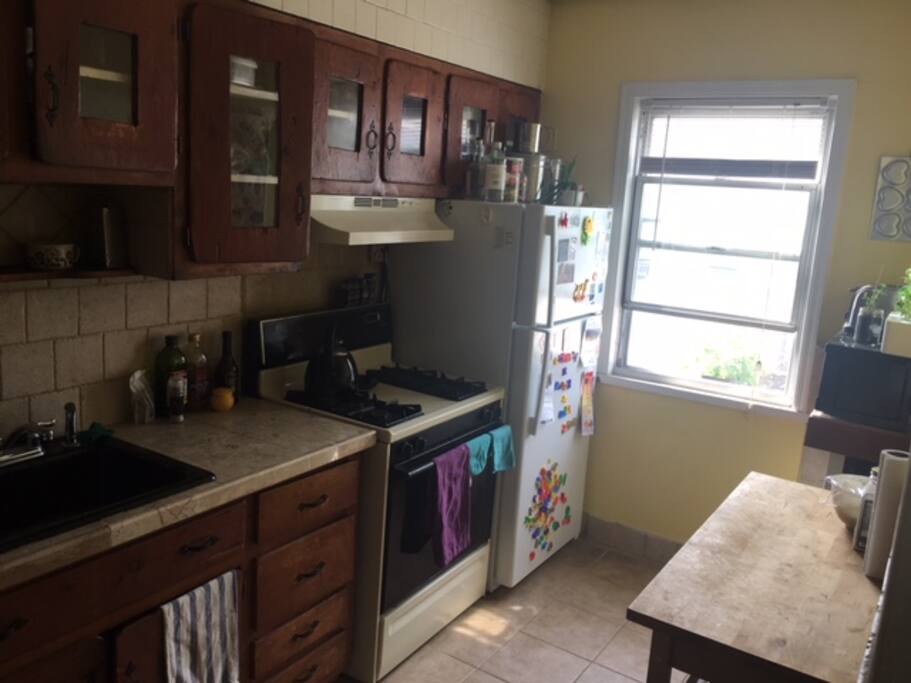 Large kitchen with your own shelf in refrigerator.