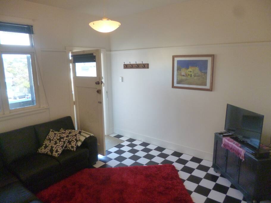 Entry to the apartment and into the lounge space.