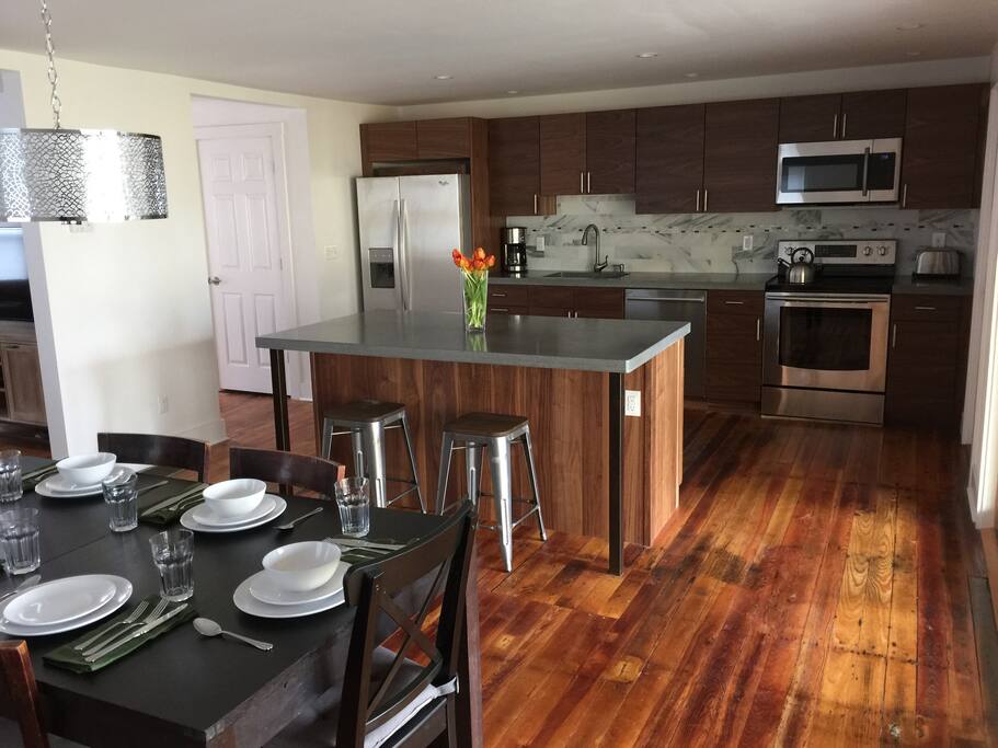 Dining area shown open plan kitchen