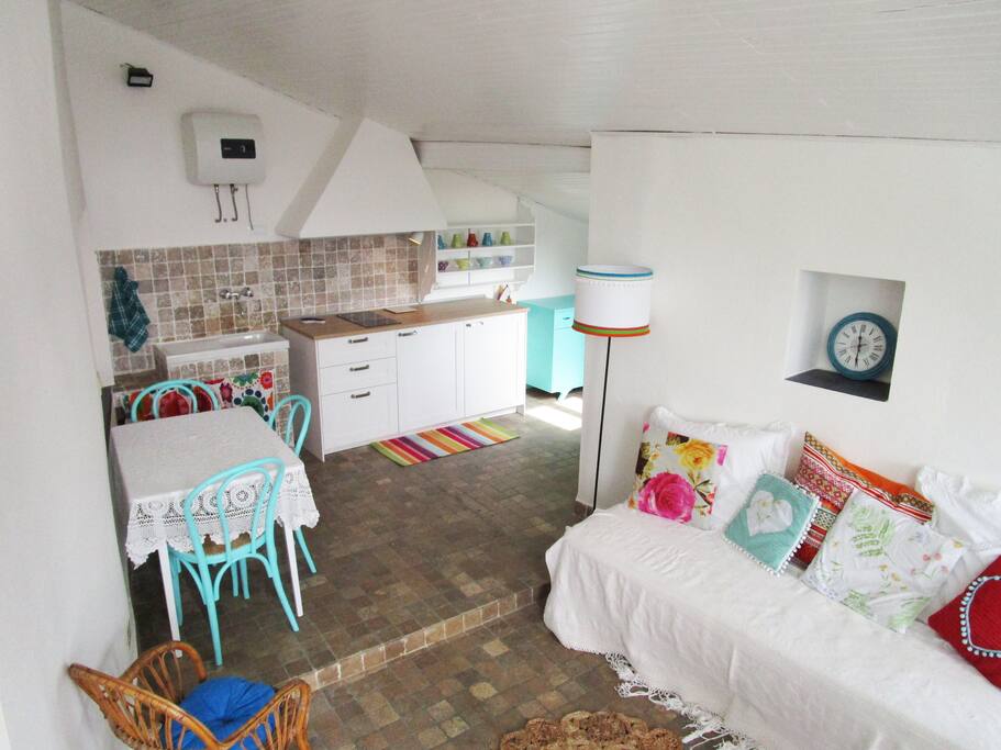 the living room on the top floor, eith the sofa/single bed.