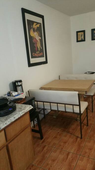 dining area behind the small kitchen, but very functional for a business traveler, student etc