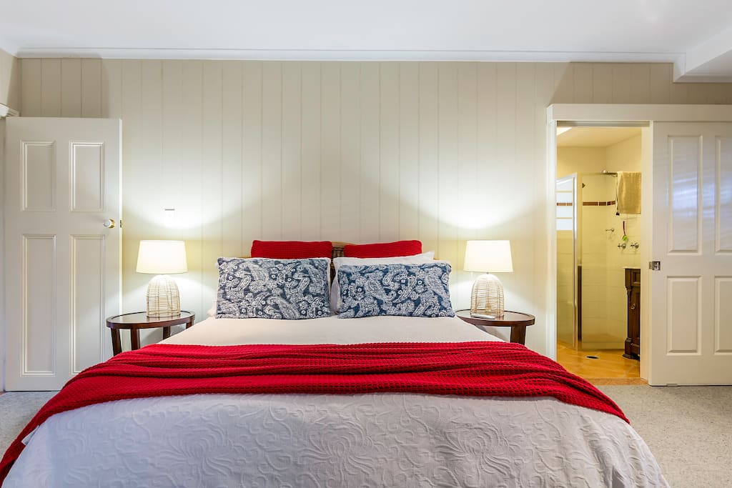 Large open bedroom with ensuite bathroom