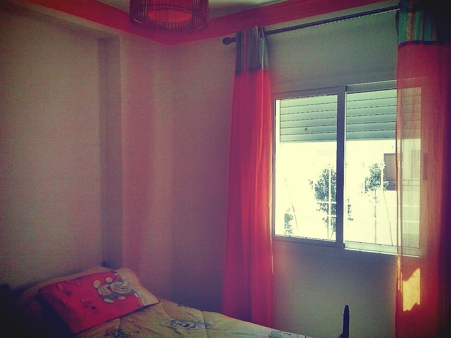 Kids room with two single beds