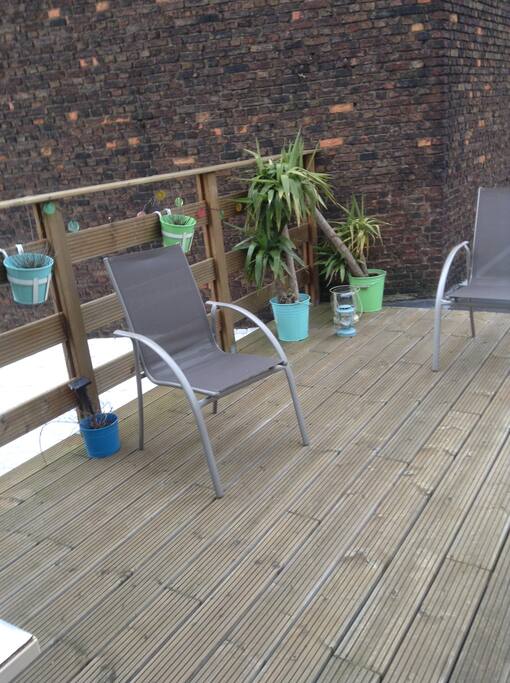 A terrace, sunny with breakfast and in the afternoon