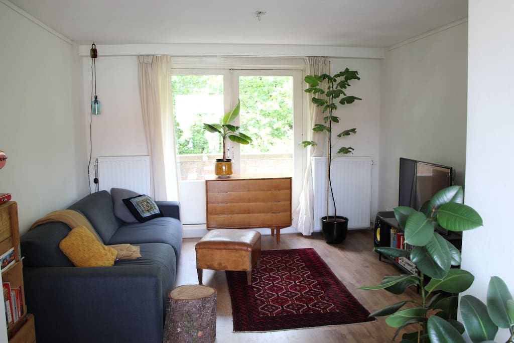 Our cozy living room with extremely comfortable couch and big tv with all the channels, Spotify music and Netflix series you could wish for. Mind you, we love to read and have some great books.