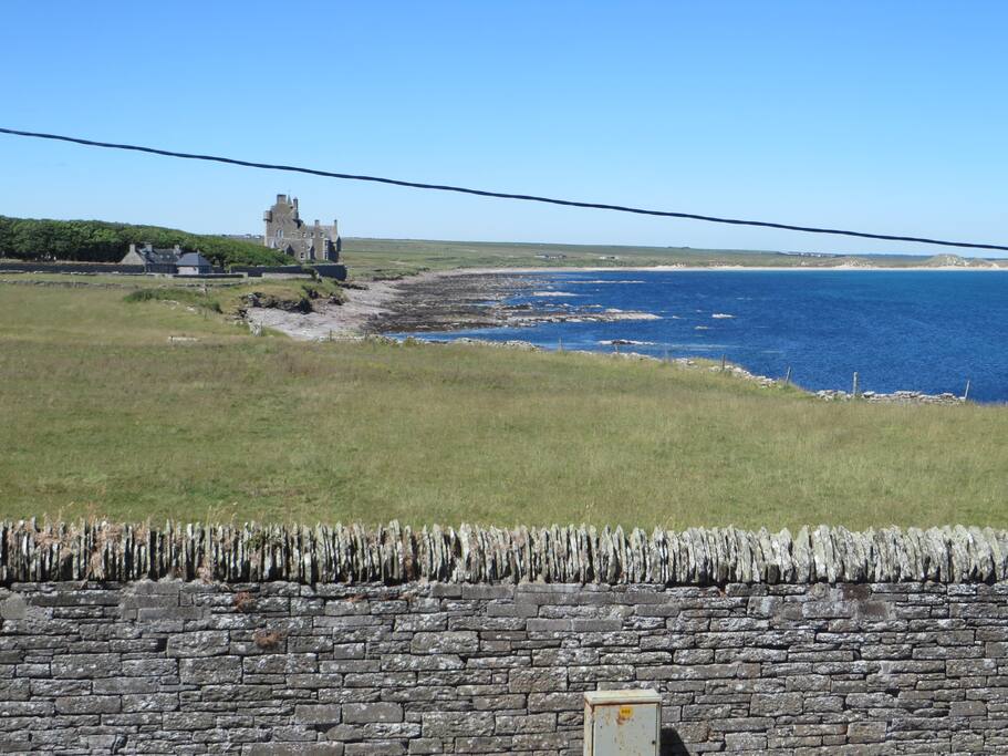 View from the master bedroom looking towards Ackergill Tower and beach.