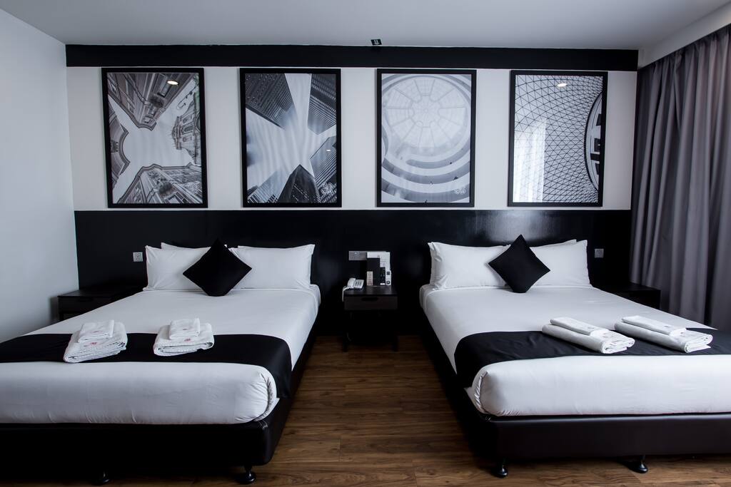 Two queen bed with high quality bed linen, duvet and pillows