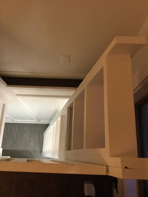 Ladder from the main floor to the bedroom. Wide steps and comfortable angle to use.