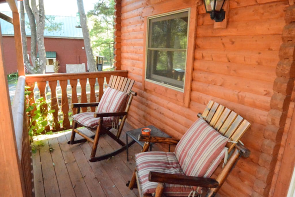 Front Porch. A stones throw from the pond.
