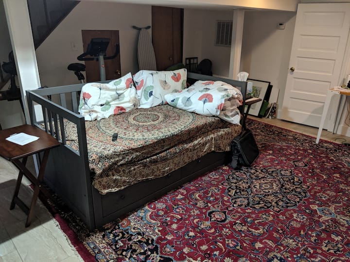 Basement with single bed which converts to a king size bed.