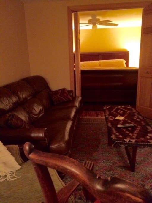 King bedroom alcove and living room with couch