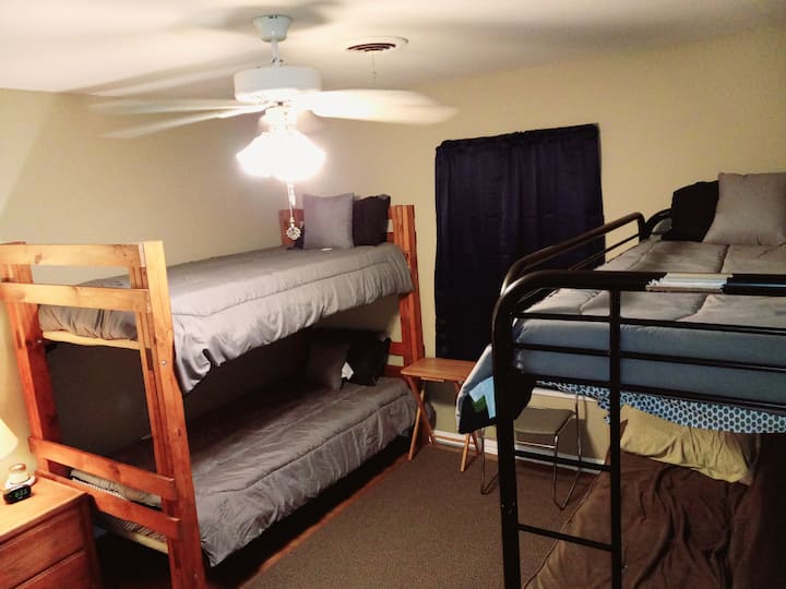 Bunkroom with 3 twin size beds and a Full-Size Futon.
