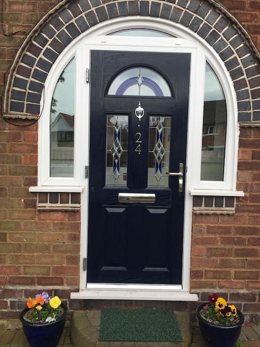 Front door with adjacent Parking Area
