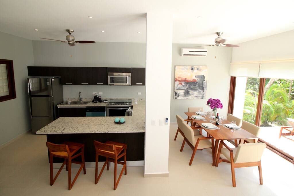 Kitchen with breakfast bar and a separate dining area