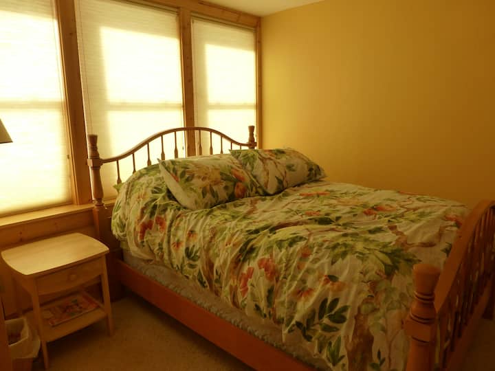 Sunburst Room with one double bed.
